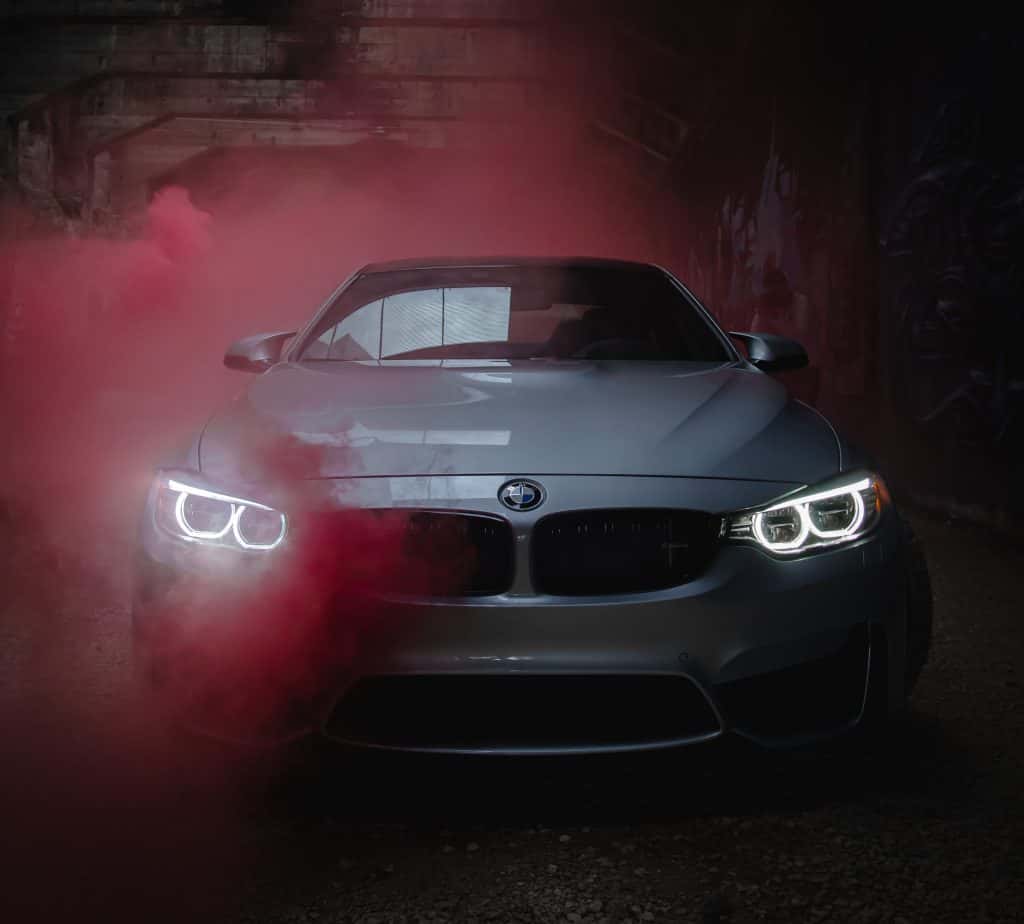 car photo with red smoke