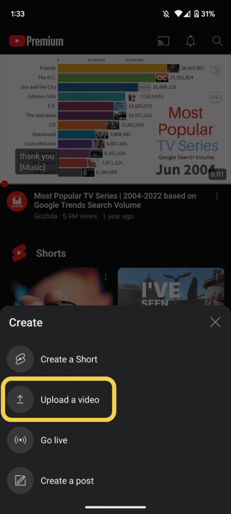 Select upload a video on YouTube app for android